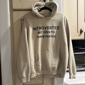 “Introverted but open to theme parties” cream custom hoodie